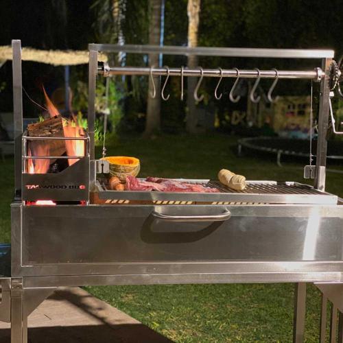Tagwood BBQ Ultimate Series Argentine Santa Maria Wood Fire & Charcoal Freestanding Grill - 714 sq. in. of total grilling area - BBQ03SS - Stono Outdoor Living Co