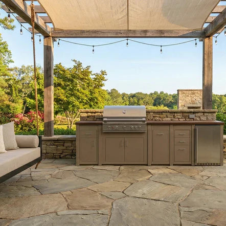 Designing the Ultimate Backyard: Why an Outdoor Kitchen and Swing Bed Work So Well Together