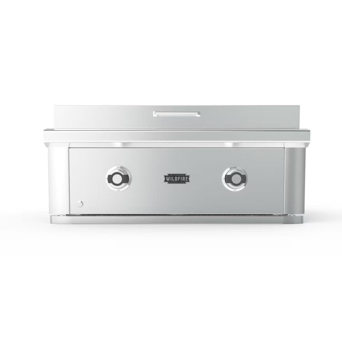 Stono Outdoor Living Front view of the Wildfire Outdoor Living Ranch Pro 30" Griddle 304 SS Propane (WFPRO30GRD-SS-LP) with two stainless steel burners, Wildfire logo in the center, closed lid—ideal for any outdoor kitchen setup.