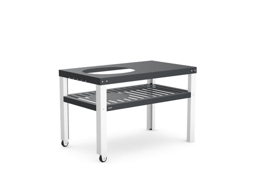 Stono Outdoor Living The Stono Outdoor Living BBQ Cart features a modern rectangular black top with a circular cutout, a lower slatted shelf, and four legs—two with wheels for easy mobility—ideal for kitchen or utility use.