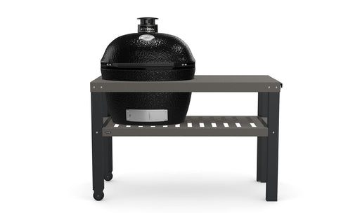 Stono Outdoor Living The Stono Outdoor Living BBQ Carts feature a black ceramic grill with a thermometer, set in a gray metal cart with a shelf and two wheels, perfect for outdoor cooking.